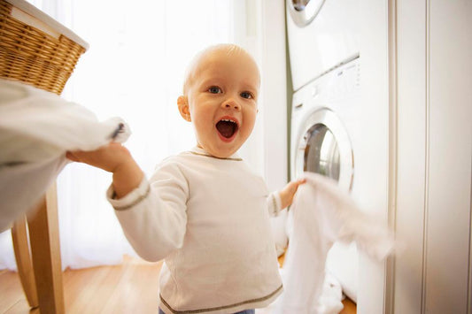 How can I remove urine smell from baby clothes?