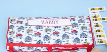A hand-smocked quilted set (blanket and pillow for baby)