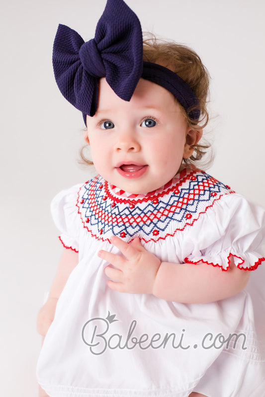 Navy Geometric smocked dress