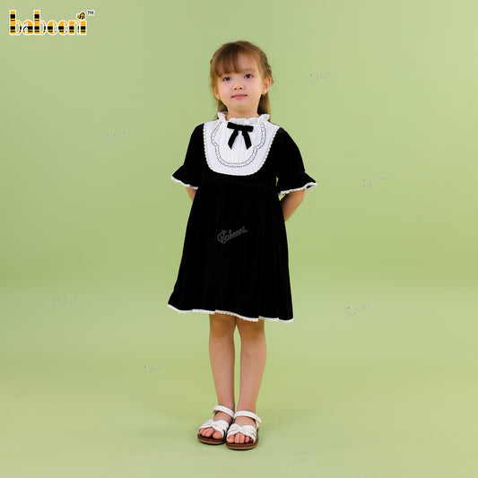 DR4555 - Midnight Elegance Velvet Dress with Ruffled Bib and Bow Detail