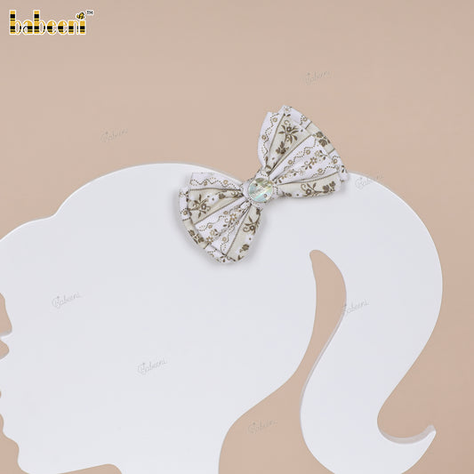 Striped floral fabric bow with glossy center accent - HB181