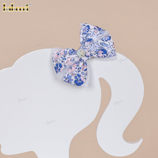 Blue and pink floral fabric bow with lace trim and glossy center accent - HB187