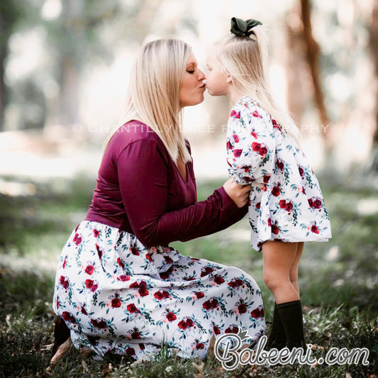 Happy smiles from two mummy & daughter