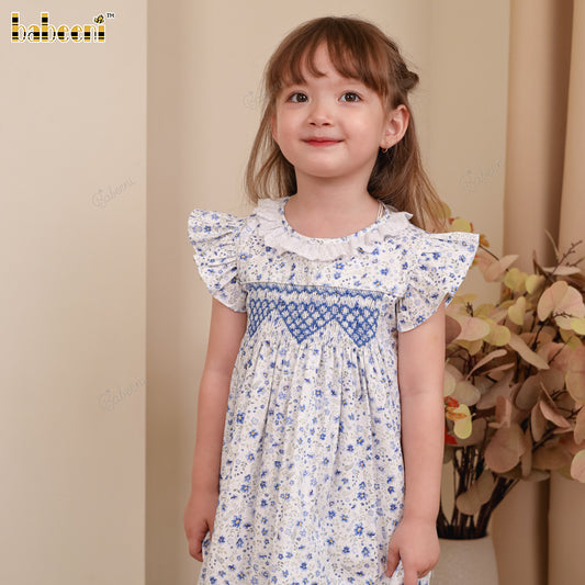DR4410 – Girls’ ECO Flared Dress with Smocking and Lace Neckline