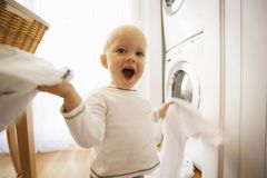How can I remove urine smell from baby clothes?