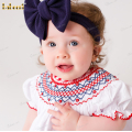 smocked-bishop-in-white-with-red-accent-around-neck-and-sleeve-for-girl--
